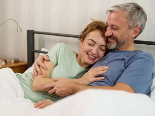 Mature couple embracing, supported by Stamina for Men herbal supplement